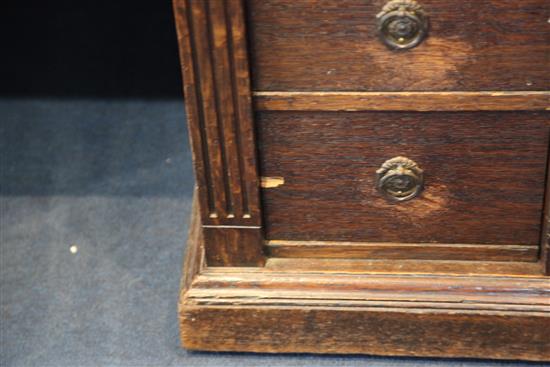 A late Victorian oak desk by Gillow, 3ft x 2ft 6in.